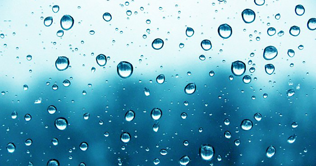 close up image with water droplets on the inside of a window